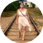 woman wallking on railway